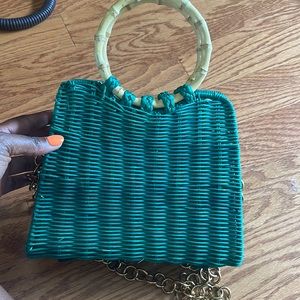 Green and gold straw bag